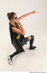 Naty BATGIRL KNEELING POSE 2